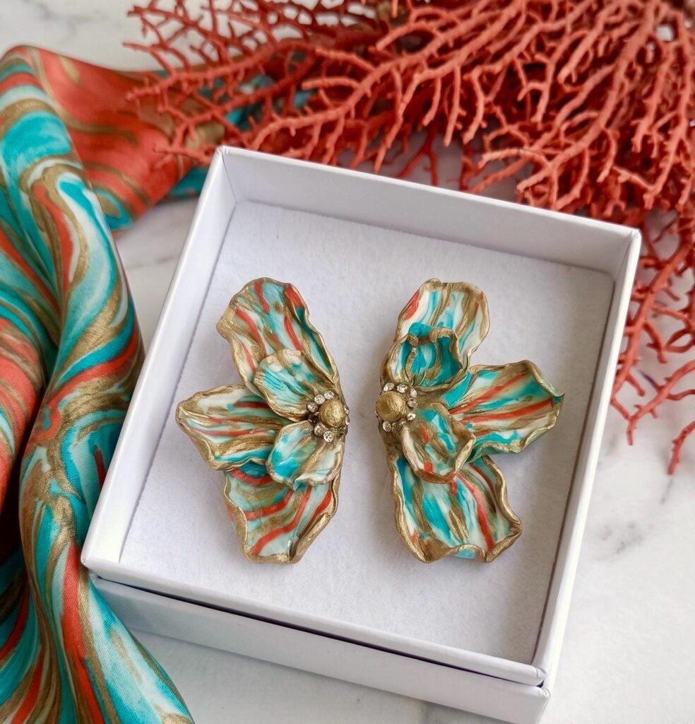 Pendientes de mariposa hechos a mano en arcilla polimerica, resinas y acero inoxidable